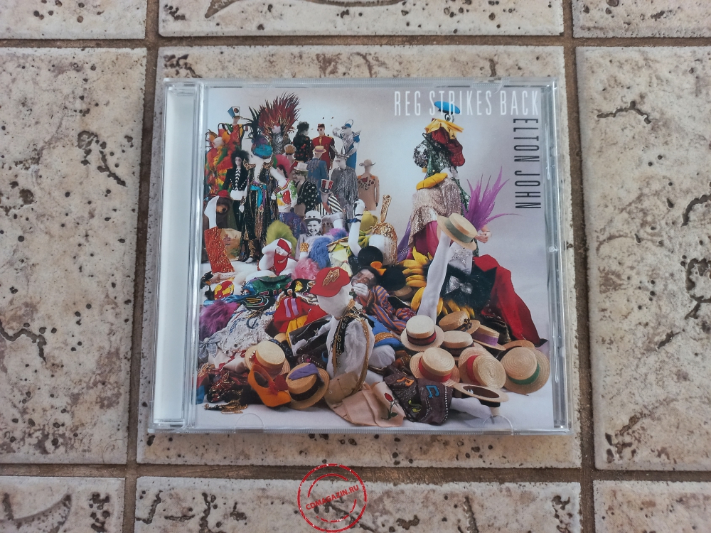Audio CD: Elton John (1988) Reg Strikes Back
