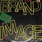 MP3 альбом: Brand Image (1988) AROUND GOES THE WORLD (Single)